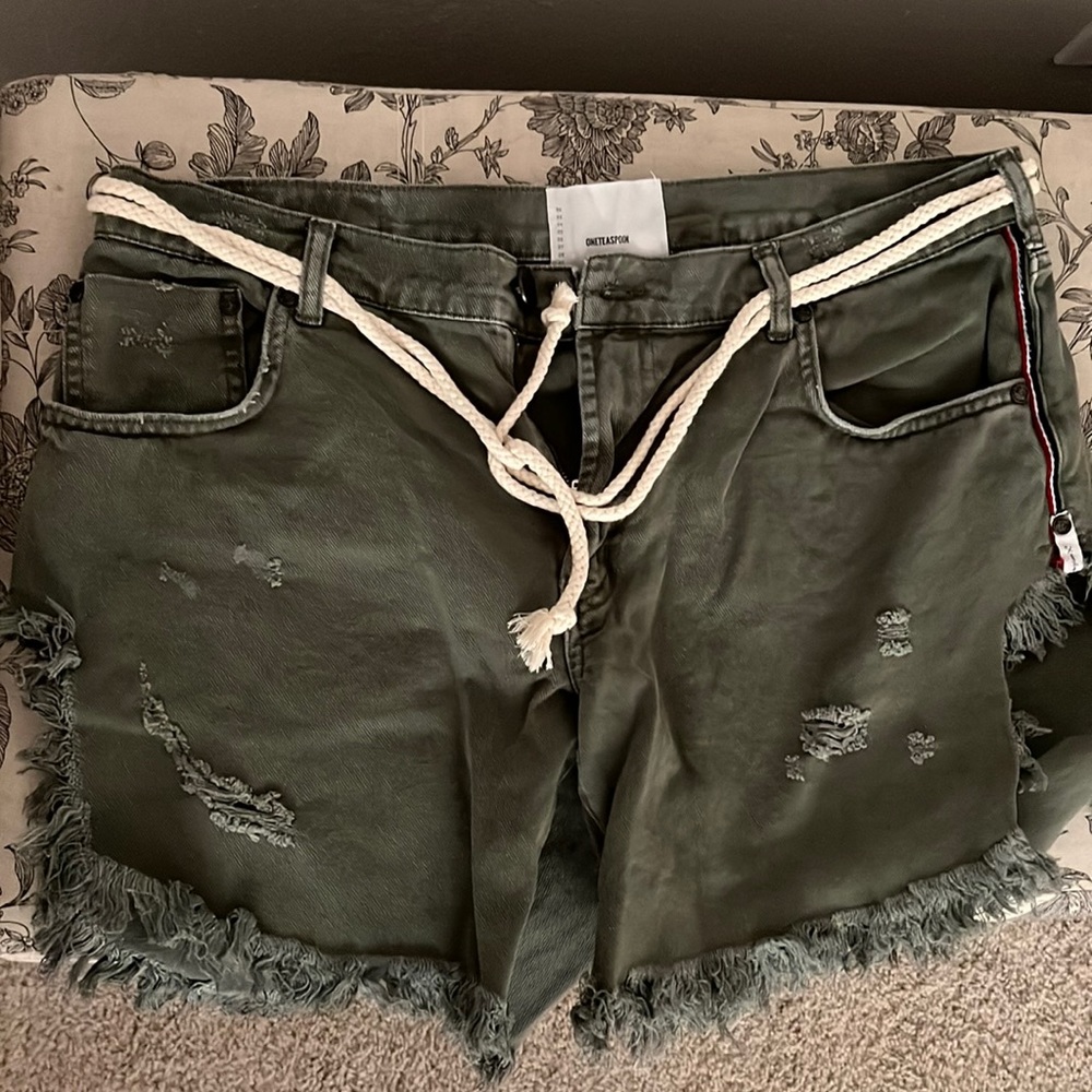 Size 31 distressed olive shorts with rope waist detail